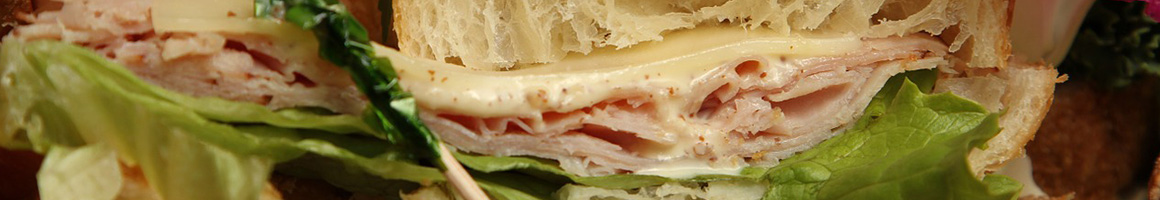 Eating Sandwich at T J's Submarines restaurant in La Puente, CA.